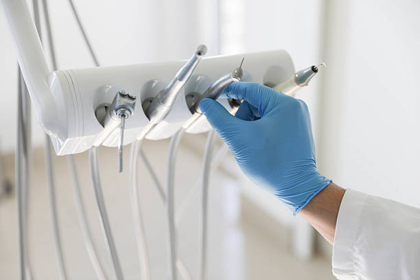 Professional Tooth Extraction technician working in Oglethorpe, GA
